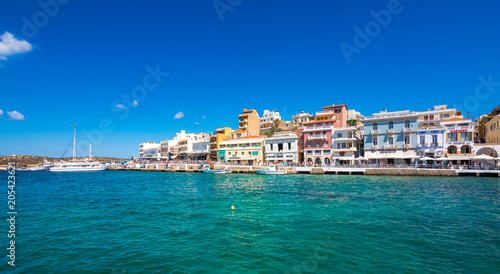 Fototapeta Naklejka Na Ścianę i Meble -  Agios Nikolaos,  a picturesque coastal town with colorful buildings around the port in the eastern part of the island Crete, Greece