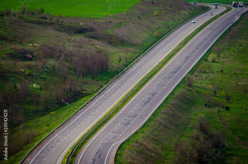 Two empty parallel lanes of a highway without cars top view
