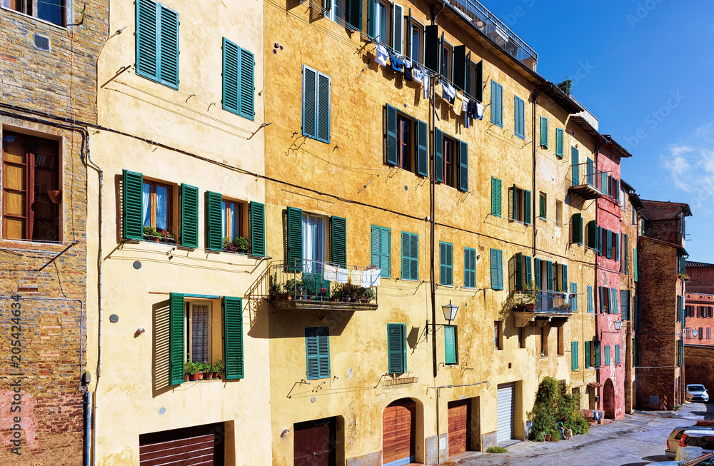 Colorbul buildings in old city of Siena