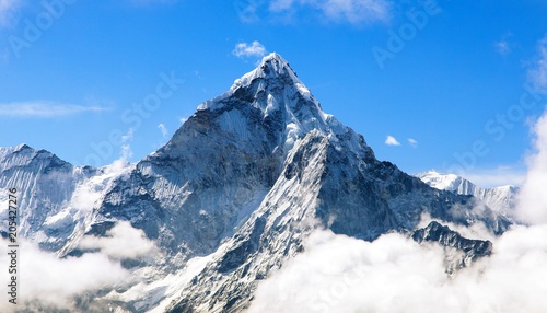 Mount Ama Dablam within clouds photo