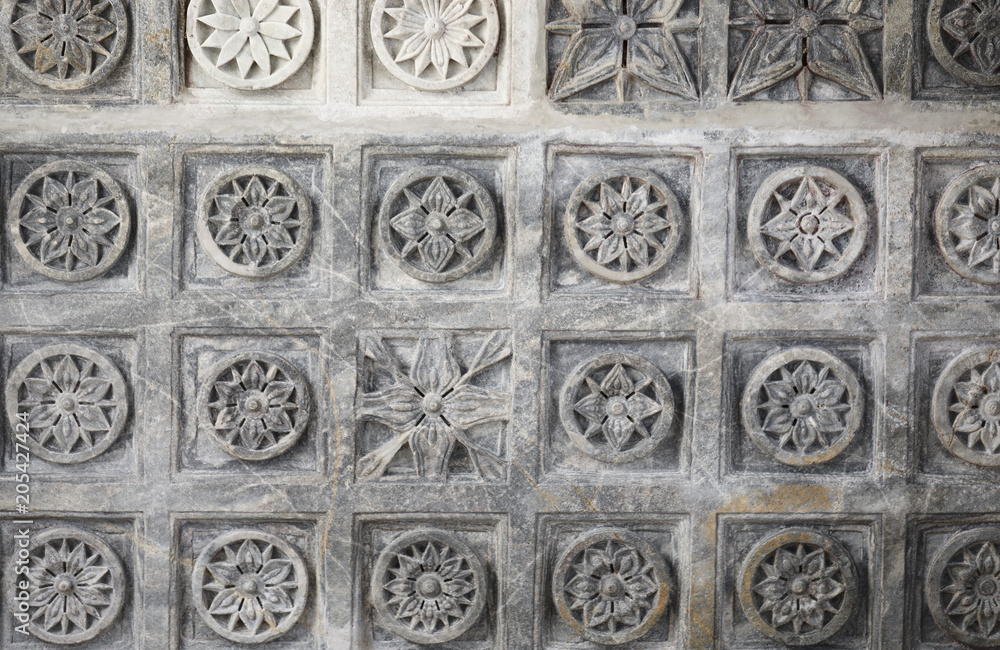 Ancient Architectural Ornament, Stone Carving Decorations Inside Ranakpur Jain Temple in Rajasthan, India Ancient Architectural Ornament, Stone Carving Decorations Inside Ranakpur Jain Temple in Rajasthan, India