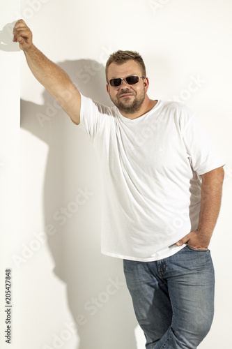 man and white wall background 