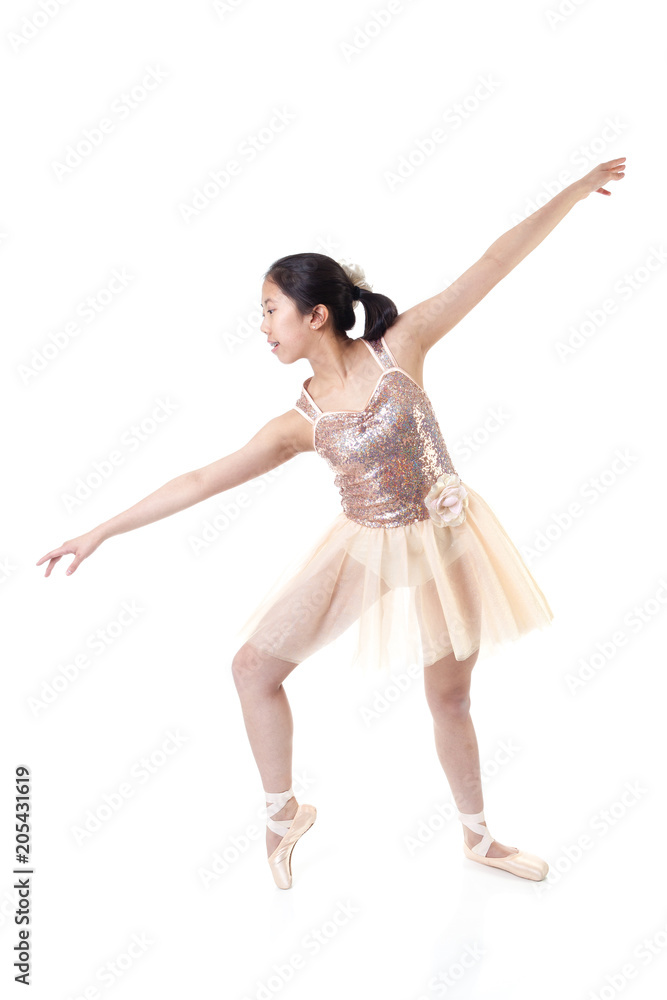 Young Ballerina Making a Ballet Pointe Movement Young Ballerina Making a Ballet Pointe Movement