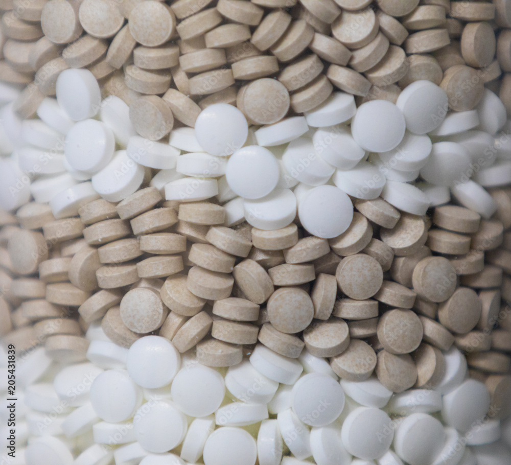 Background - close up of countless colourful medicine tablets with shallow depth of field, bokeh Background - close up of countless colourful medicine tablets with shallow depth of field, bokeh