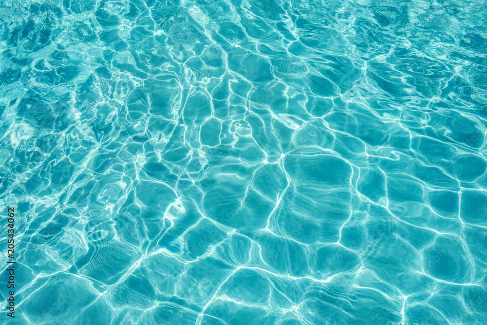 Background of clear turquoise pool water