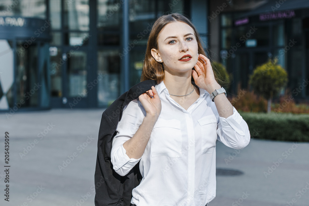 A business woman goes down the street. A girl in a business suit at the office. A wonderful girl in the city. A business woman goes down the street. A girl in a business suit at the office. A wonderful girl in the city.