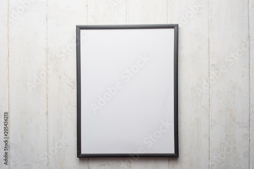 White frame on the background of a tree