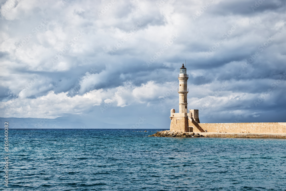 Lighthouse in the Old Venetian Harbour in Chania . Crete. Greece.