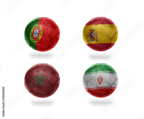 soccer team group B. football balls with national flags of portugal, spain, morocco, iran