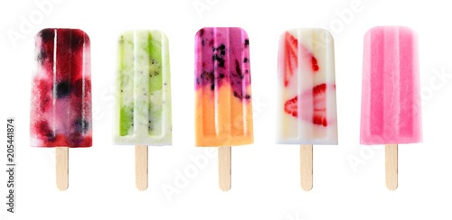 Assortment of fruit popsicles isolated on a white background