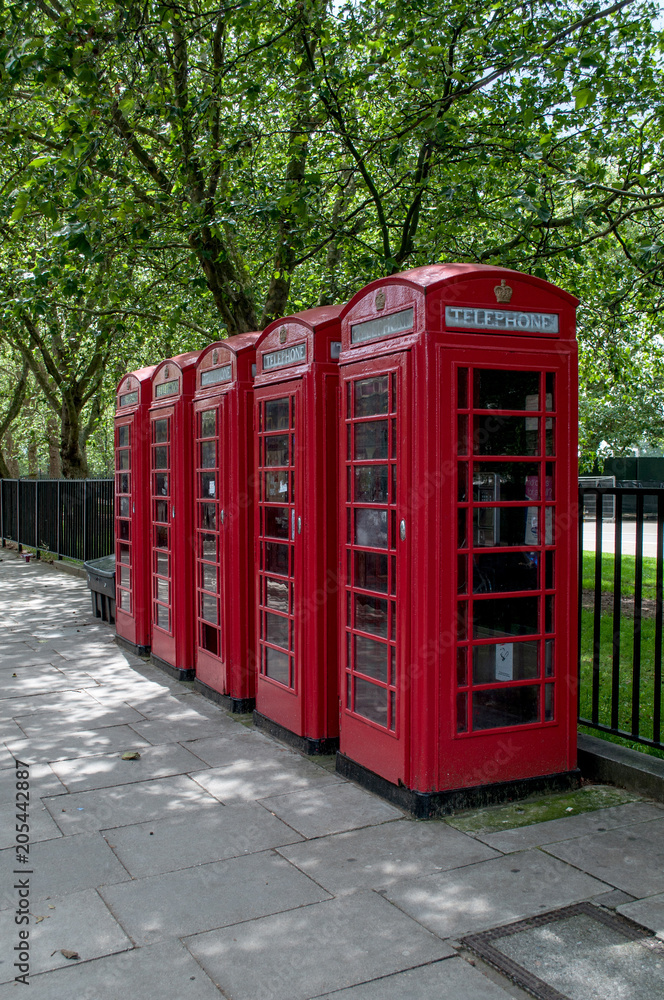 Obraz premium Typical red telephone booths in central London (United Kingdom)