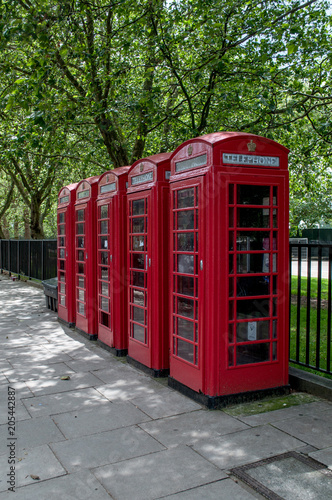 Typical red telephone booths in central London  United Kingdom 