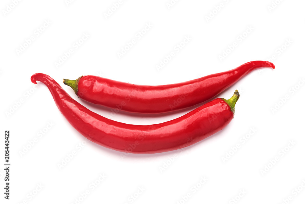 Two hot chili peppers isolated on white background