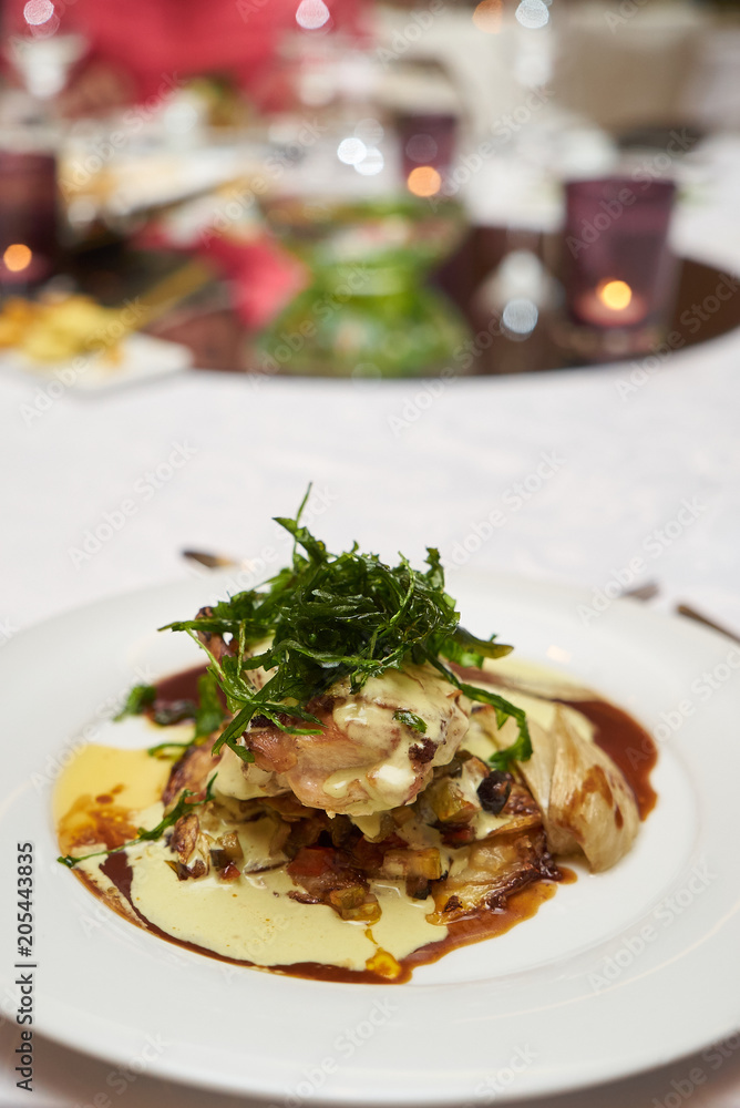 Healthy vegetarian food with marinated tomatoes, arugula, mozzarella, balsamic jelly, fresh olive oil on white plate, close-up. Delicious Diet food concept Healthy vegetarian food with marinated tomatoes, arugula, mozzarella, balsamic jelly, fresh olive oil on white plate, close-up. Delicious Diet food concept