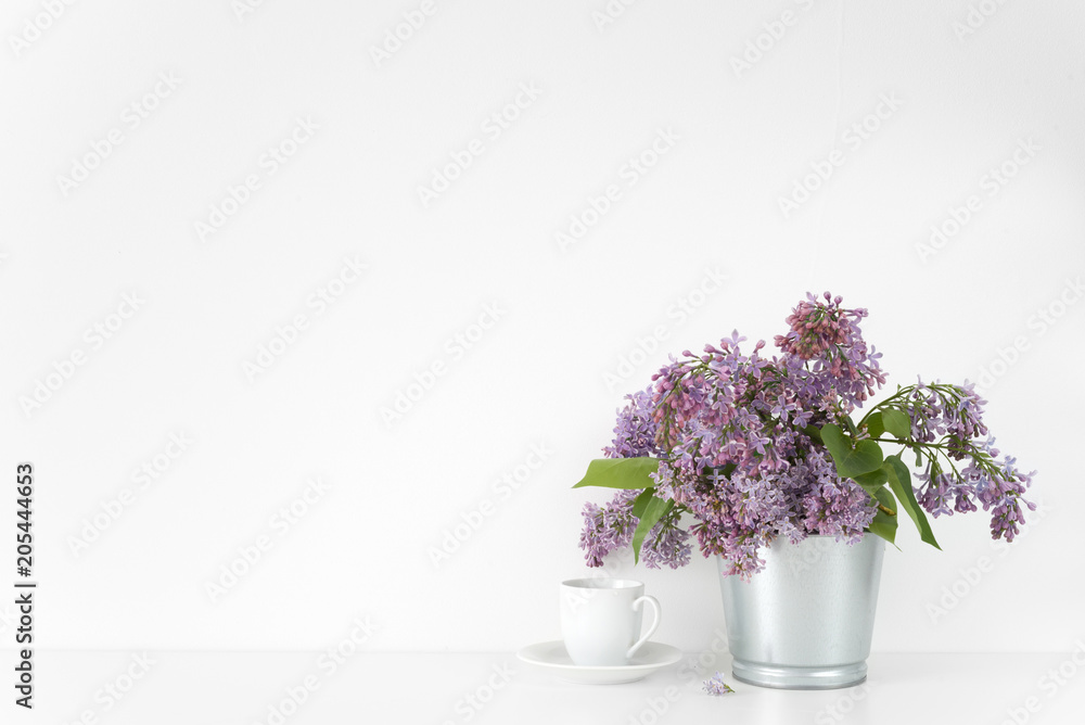 Composition with lilac bouquet on white background