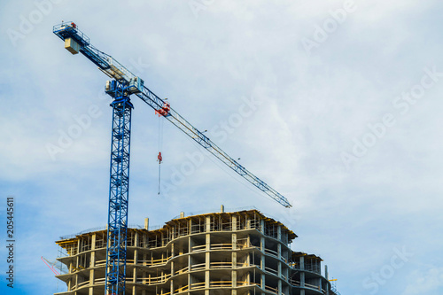 Machinery crane working in construction site building industry