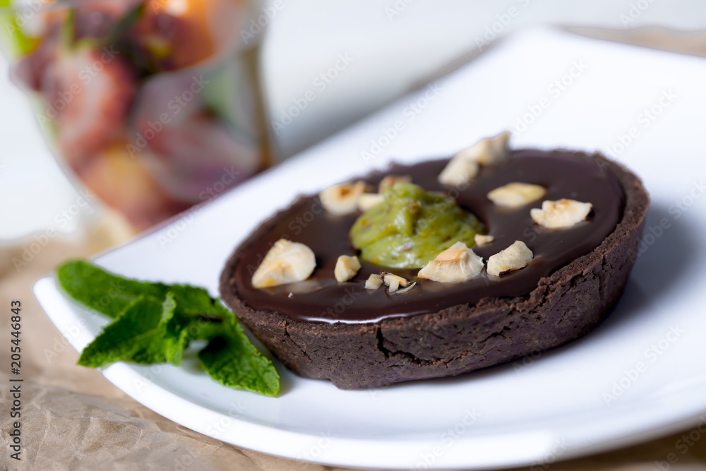 chocolate tart with pistachio and and hazelnut