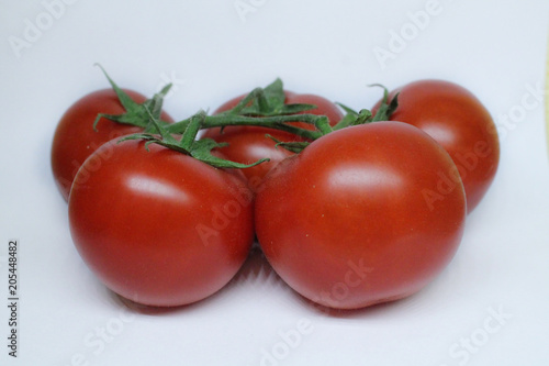 red tomatoes background. Group of tomatoes