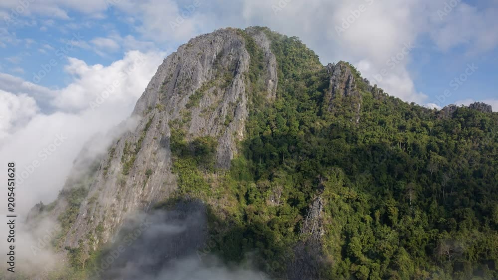 4K Time lapse of the mountain covered by clouds seen from the viewpoint near Vang Vieng village, Laos 4K Time lapse of the mountain covered by clouds seen from the viewpoint near Vang Vieng village, Laos