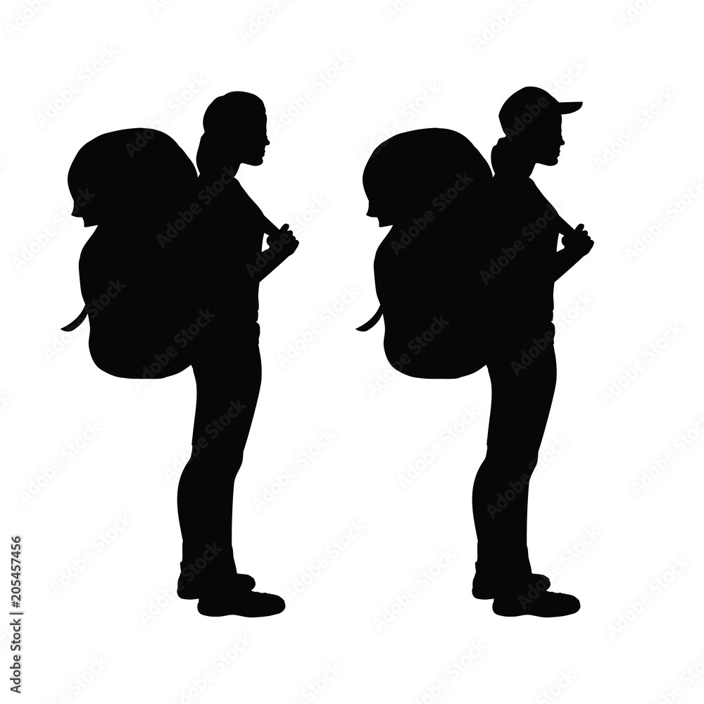 Isolated silhouette of a standing hiker girl Isolated silhouette of a standing hiker girl
