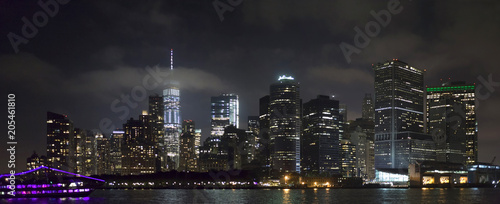 Manhattan buildings viewed from Brooklyn side and East river New York © eddie toro
