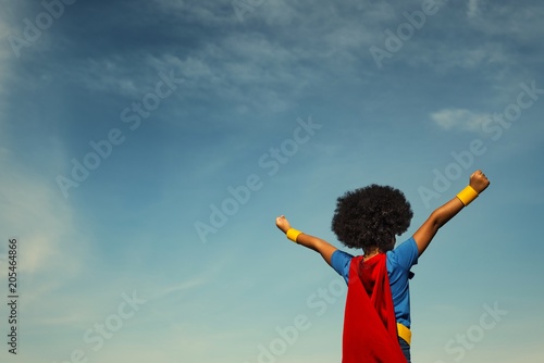 Strong superhero girl with superpowers
