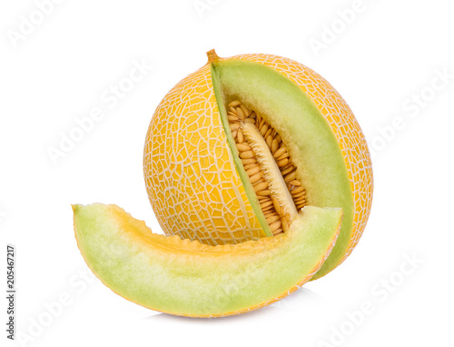 whole and slice of pearl orange melon isolated on white background