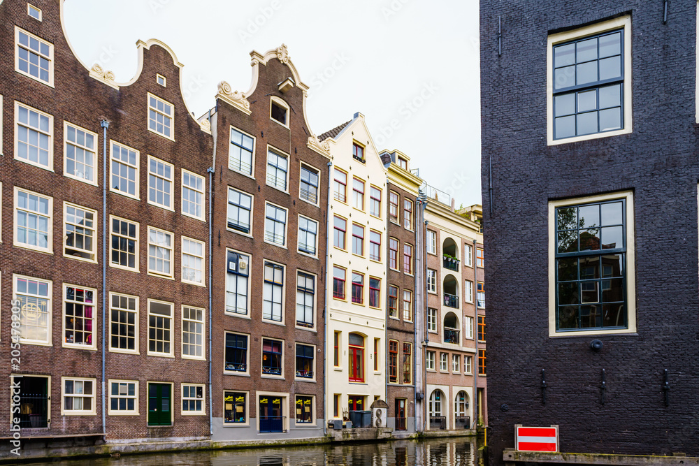 Amsterdam canals and typical dutch houses in capital of Netherlands, Europe