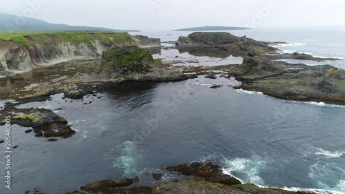 RUSSIA, MATUA Island. View from the top to the shore of the island of Matua photo