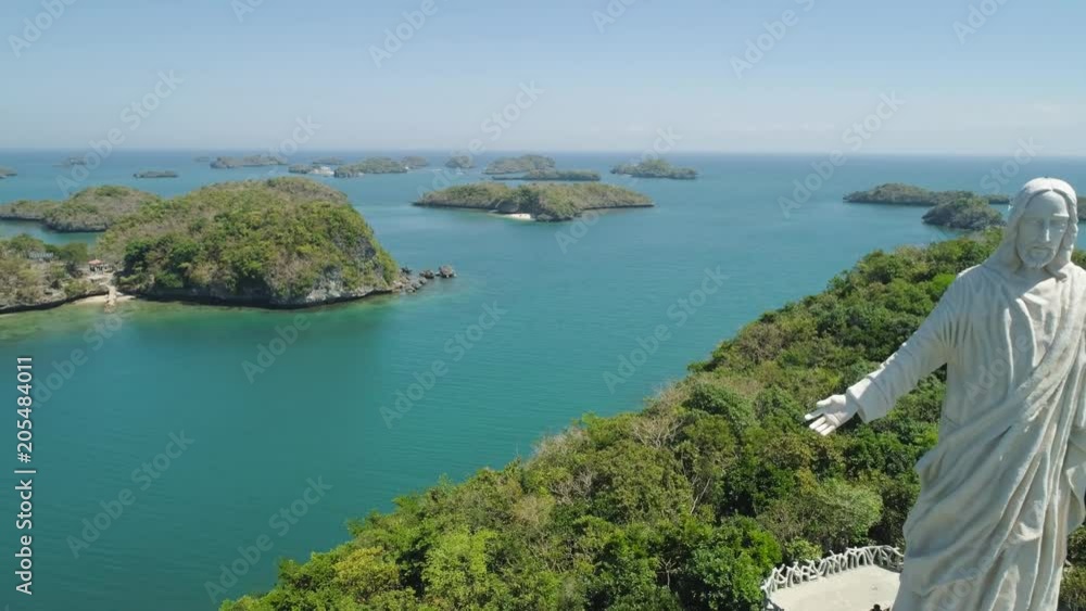 Statue of Jesus Christ on Pilgrimage island in Hundred Islands National ...