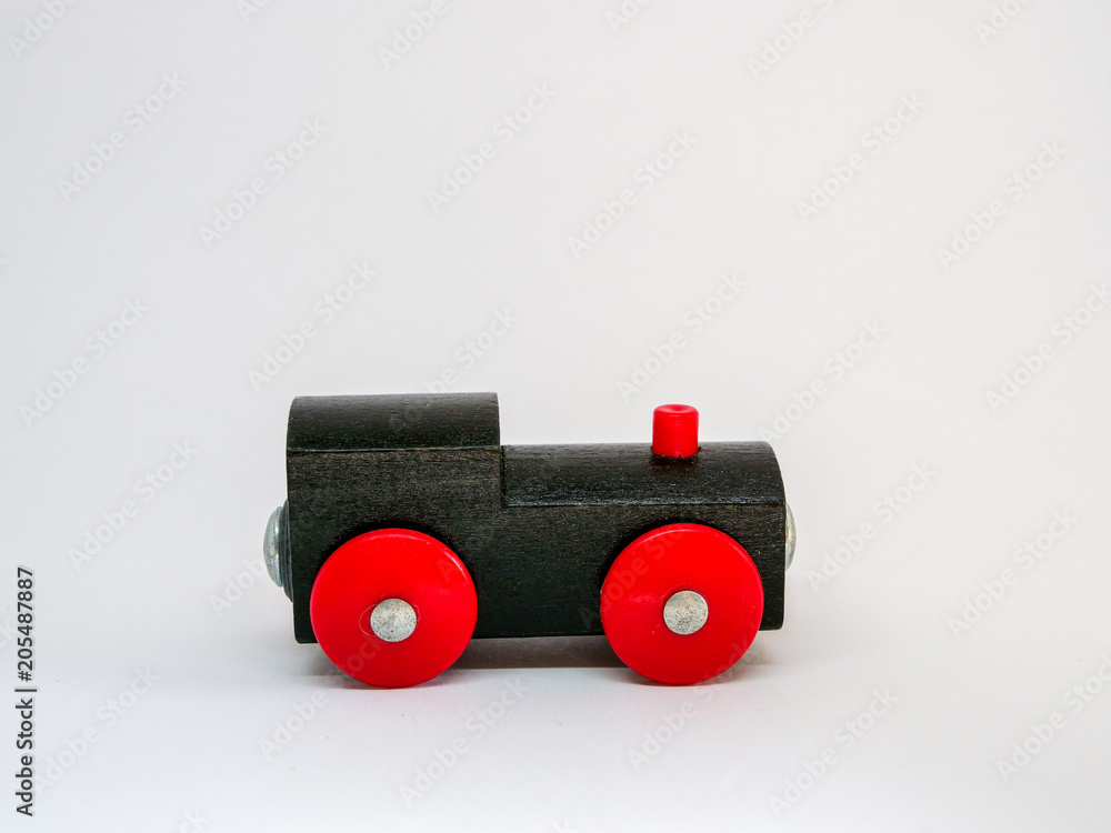 A toy train, a place for text, close-up, isolated A toy train, a place for text, close-up, isolated