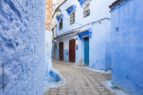 curved blue street in Morocco © sergejson
