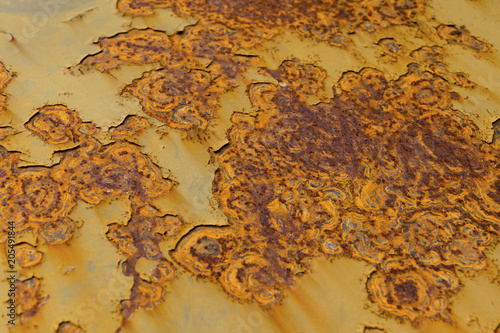 Corrosion of rust and color on old metal surfaces.