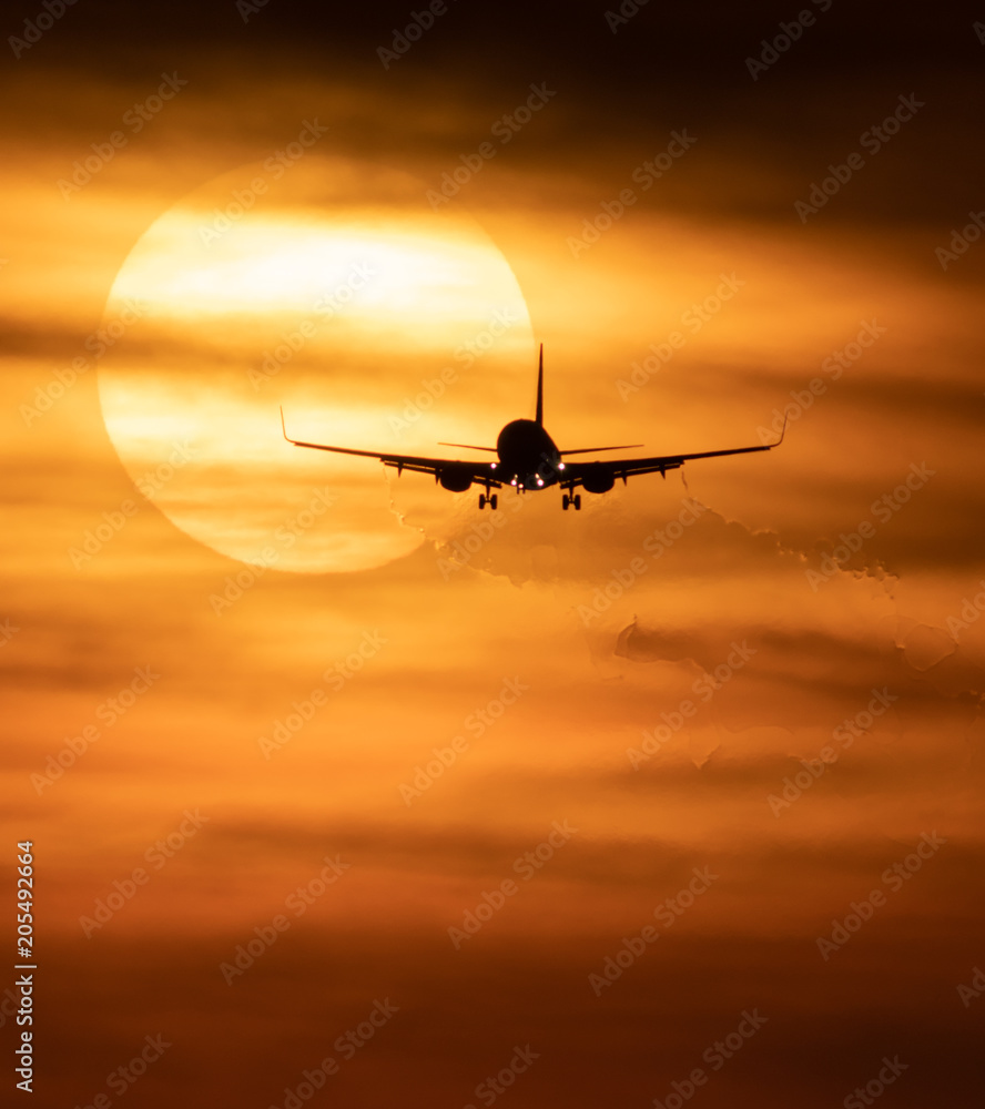 Beautiful sunset with jetTravel concept