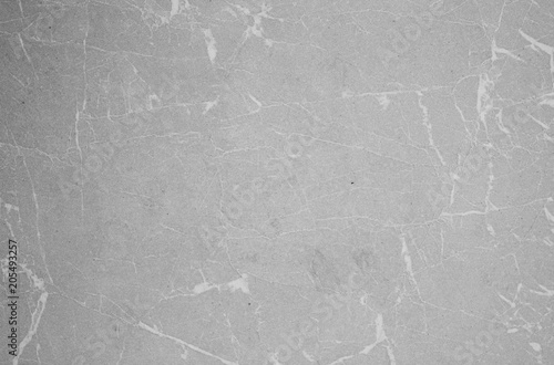 Light beige scratched background texture with white marble veins stria.