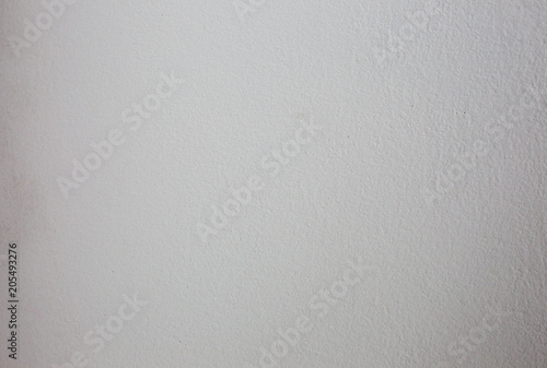 White texture background. Light grey old painted whitewash wall with scratches.