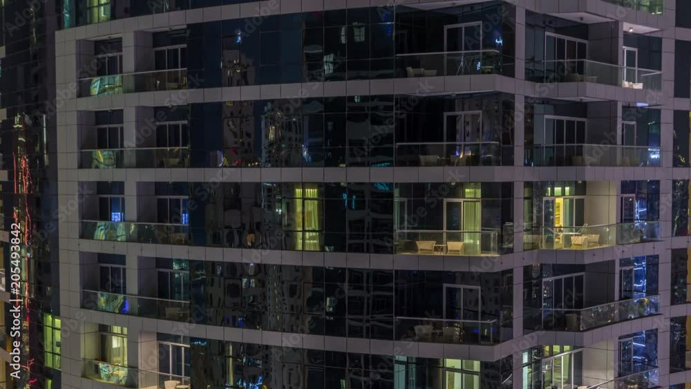 Scenic glowing windows of skyscrapers at evening timelapse Scenic glowing windows of skyscrapers at evening timelapse
