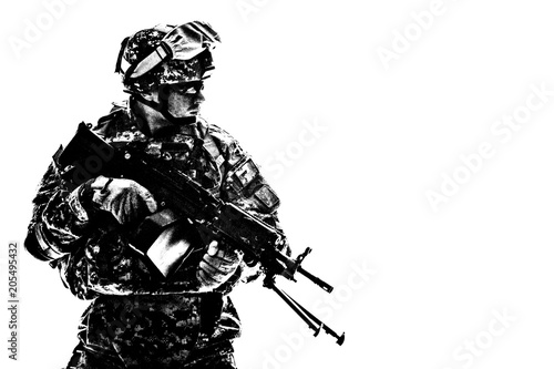 Фотография Low key side portrait of US Army Special Forces soldier in military camouflage u