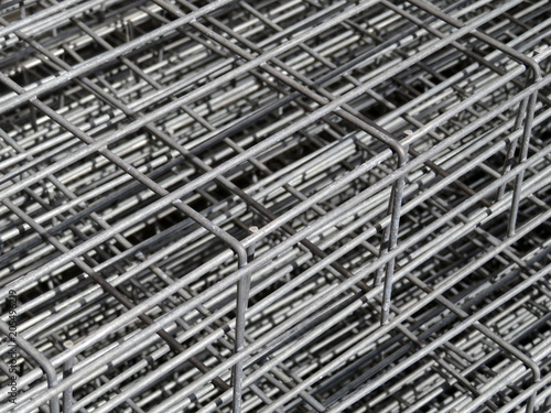 Frame from the reinforcement. Aluminum fittings and armature. Metal rolling plant background