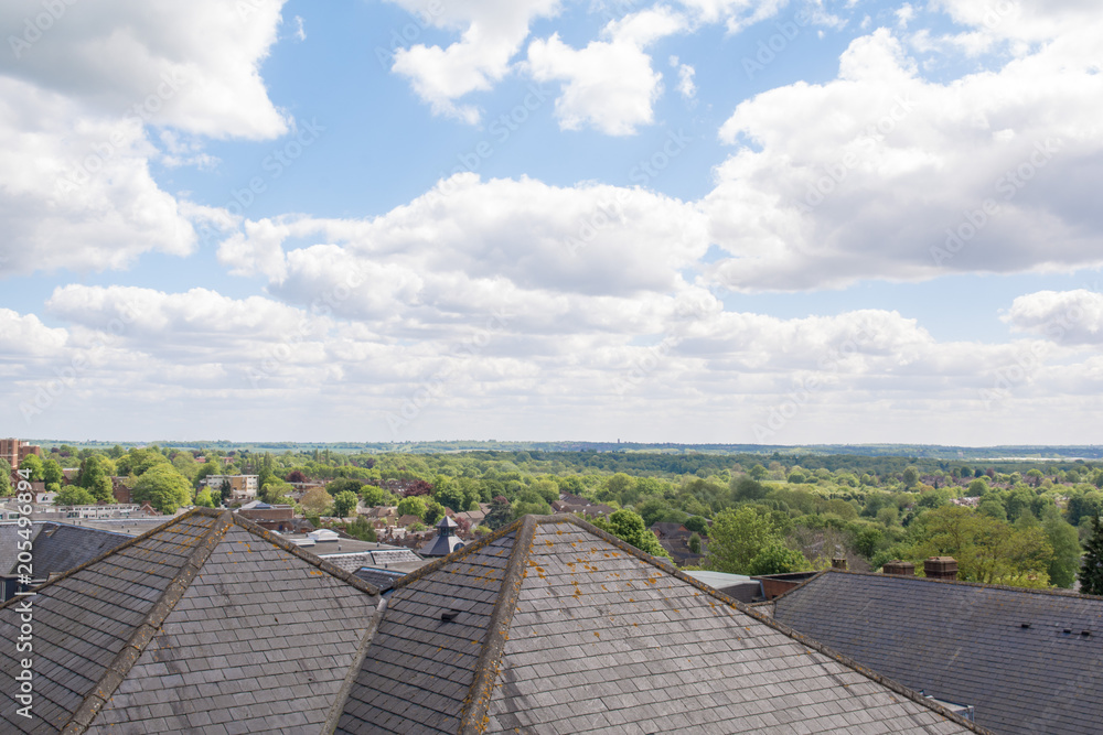 Looking over roof top from the city to the horizon