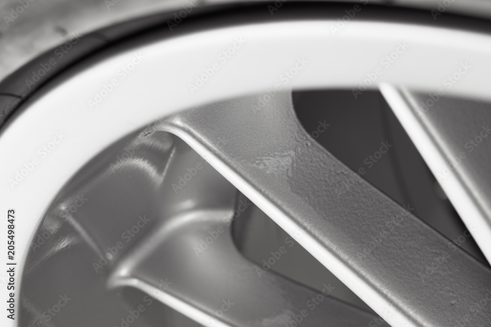 Part of silver alloy wheel with tire