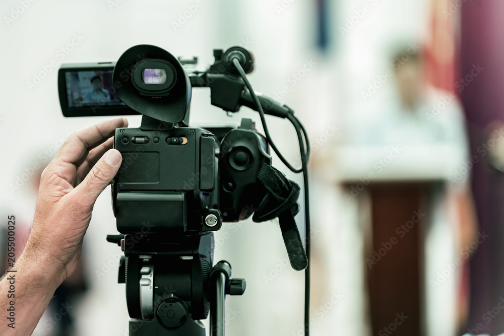 Camera at media conference