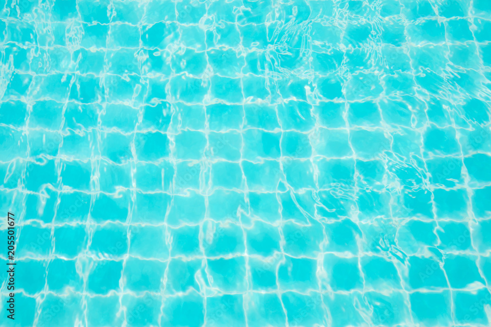 Abstract image surface of blue swimming pool water for background textured usage.