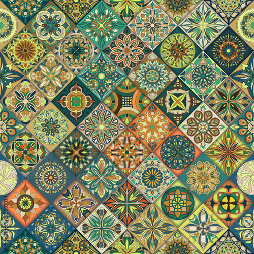Seamless pattern with decorative mandalas. Vintage mandala elements.