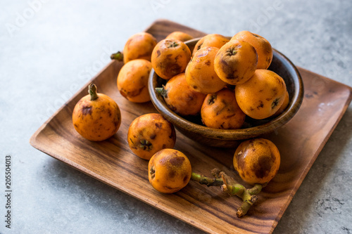 Loquat Plum Fruits / Eirobotrya Japonica Ready to Eat. photo