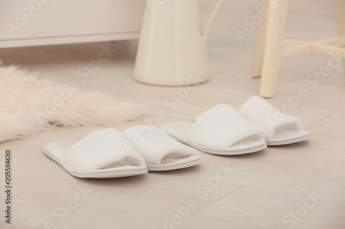 Bathing slippers on floor