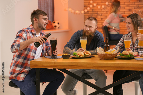 Friends with beer and snack...
