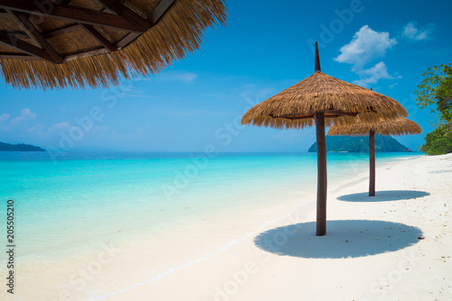 Beautiful tropical island white sand beach blue sky sunny day - Summer breeze travel holiday © pla2na