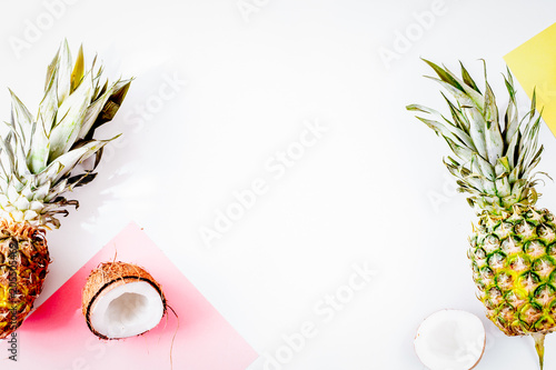 sliced coconut and pineapple in exotic summer fruit design white