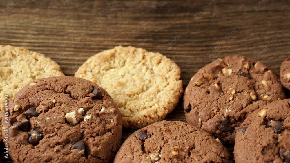 Various tasty cookies biscuits on wooden background Various tasty cookies biscuits on wooden background